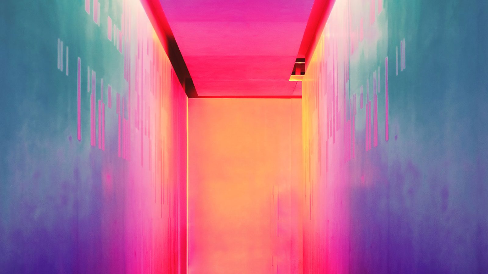 A corridor with neon lights