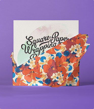 A square paper wrapping with a floral design.