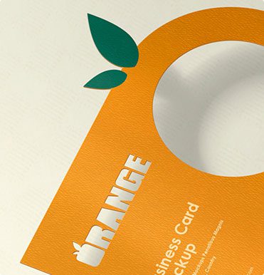 A close up of the orange business card
