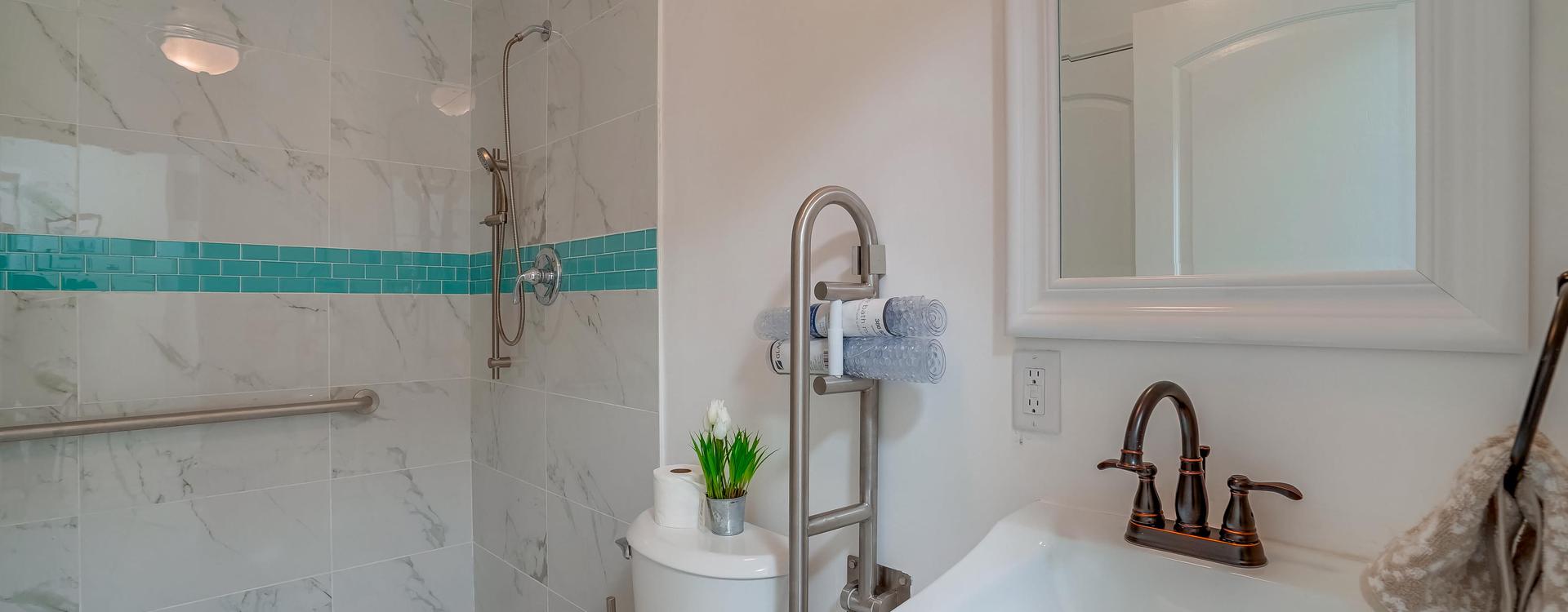 A bathroom with a toilet and a sink