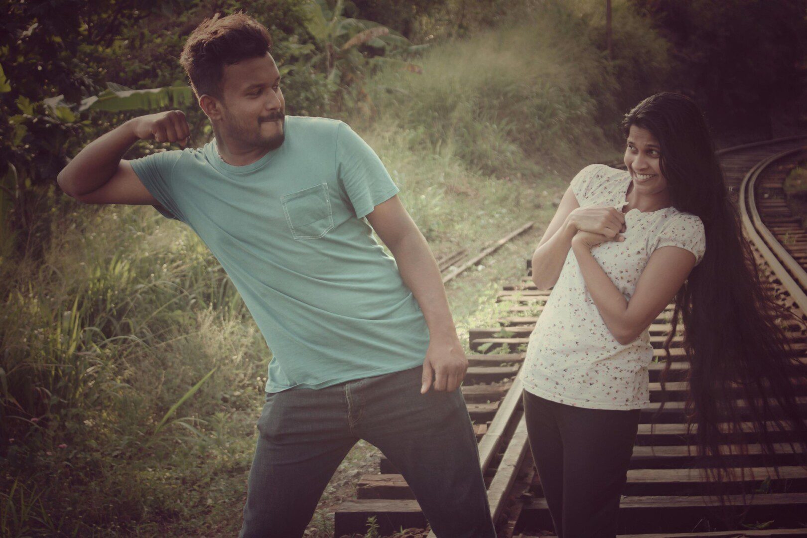 Playful moment between a man and woman.